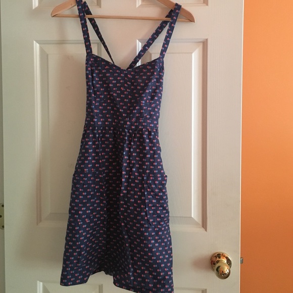 Dotted navy dress with cross-back