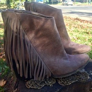 Fringe accented brown suede angle boots