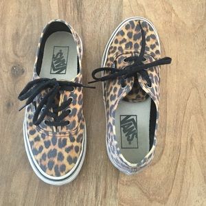 Vans sneakers. They are a men's size 4