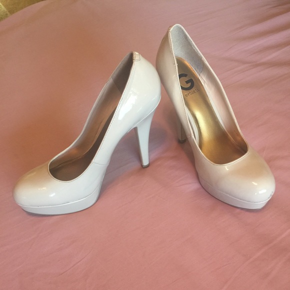 Guess nude platform pumps.