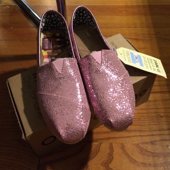 TOMS pink glitter slip-ons. NWT and box. Size 7