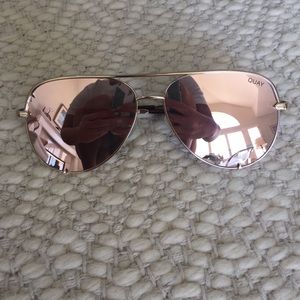 Desi Perkins High Key QUAY gold aviators.