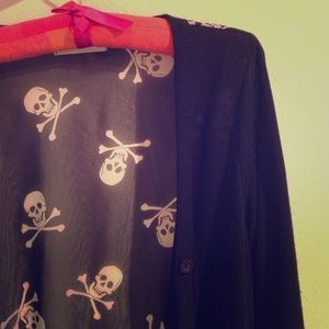 Skull and crossbones blk. cardigan, w/ sheer back.