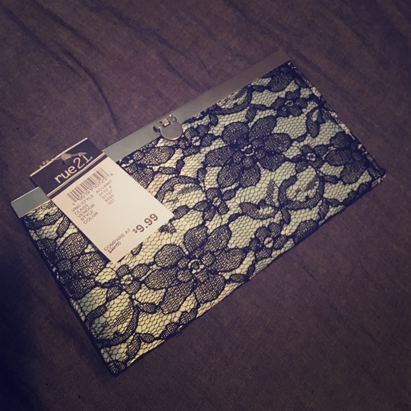 An elegant black and teal/baby blue lace wallet