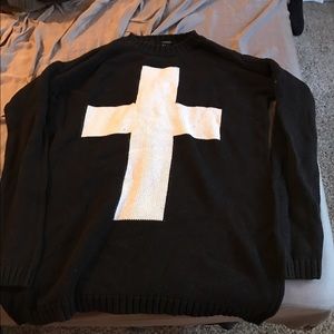 Cross sweater