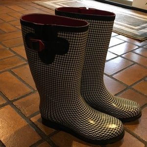 Black and white rain boots