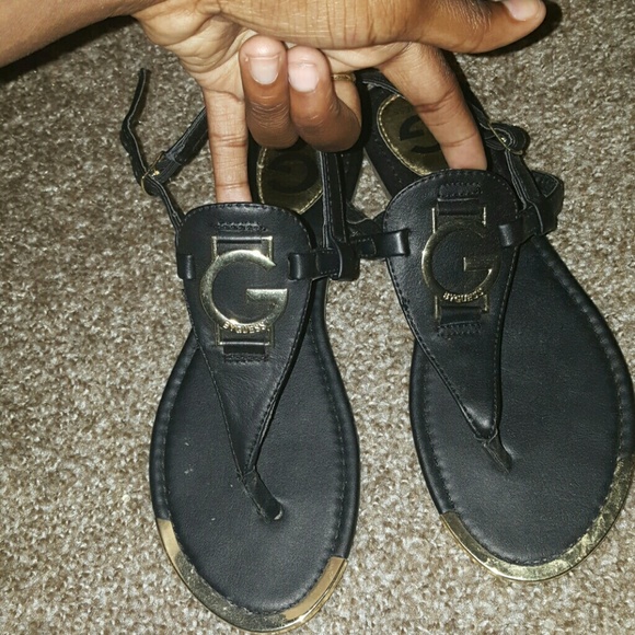 Black and gold guess shoes