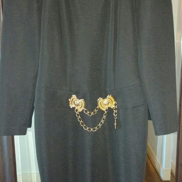 Little black dress with a twist. Black gold accent