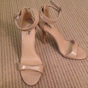 Tan patent leather pumps