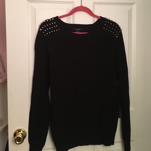Black sweater with gold studs