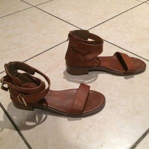Brown buckled sandals
