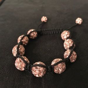 Rose gold and black adjustable bracelet