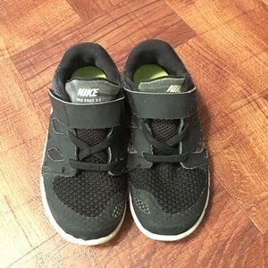Little Boys size 10 Nike tennis shoes.