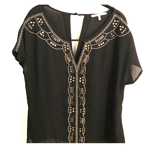 NWOT black top with gold and silver detailing