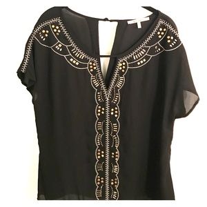 NWOT black top with gold and silver detailing