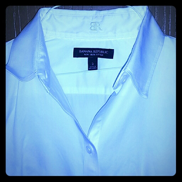 White button up blouse.