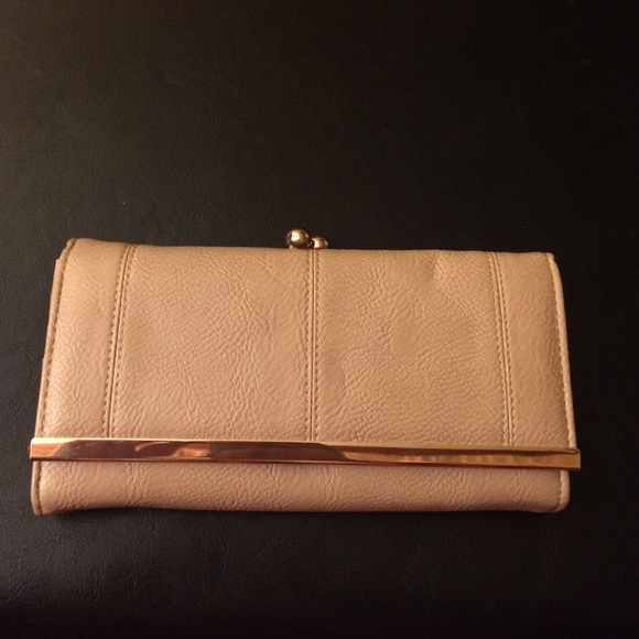 Tan and gold wallet