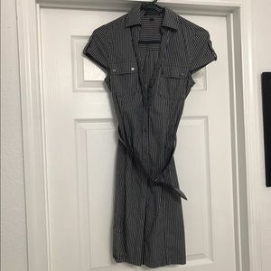 Express knee length button down dress with belt.