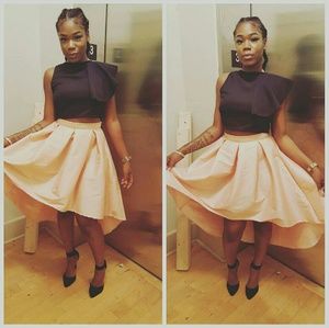 High low skirt and black crop top