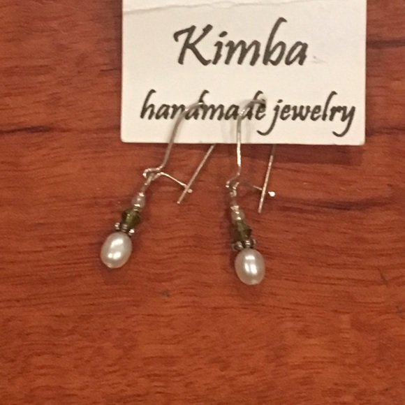 White and green dangling earrings