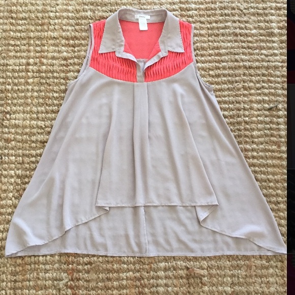 Tan sleeveless blouse