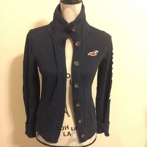 Small button up sweater. Smoke free home.