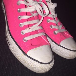 Bright pink converse