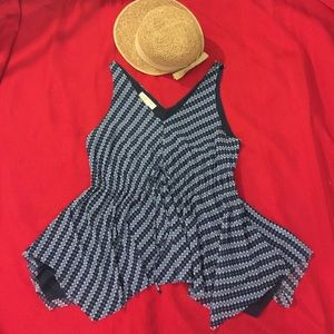 MK Ruffled Asymmetrical Hem Sleeveless Blouse