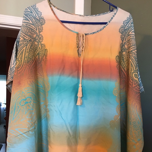 New never worn Women's multi-colored blouse