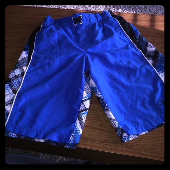 Boy's blue, black, and white plaid swim trunks!