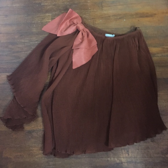 Judith March rust colored one-shoulder shirt