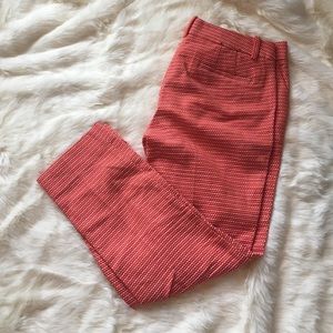 Red/orange City Fit pants.