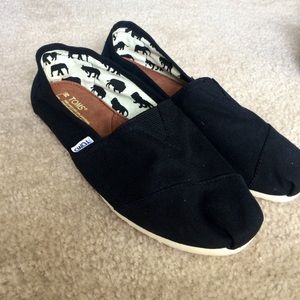 Black canvas Men's slip-on shoes.
