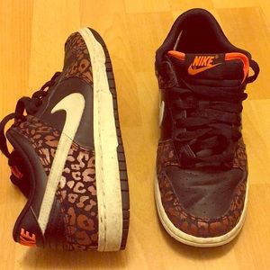 Black orange cheetah Nikes low top