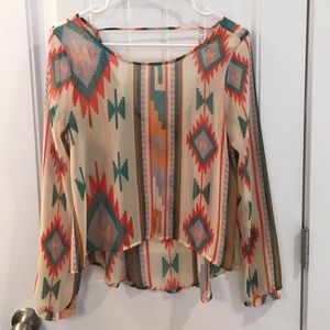 Long sleeve top with low back.