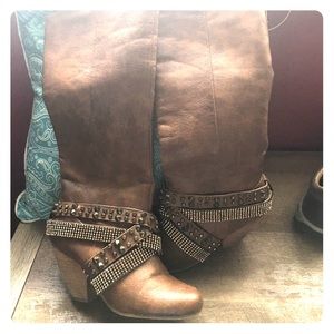 Not rated tall boots in camel color.