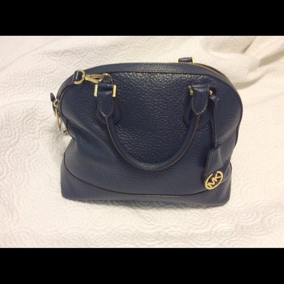 Michael Kors blue leather purse.
