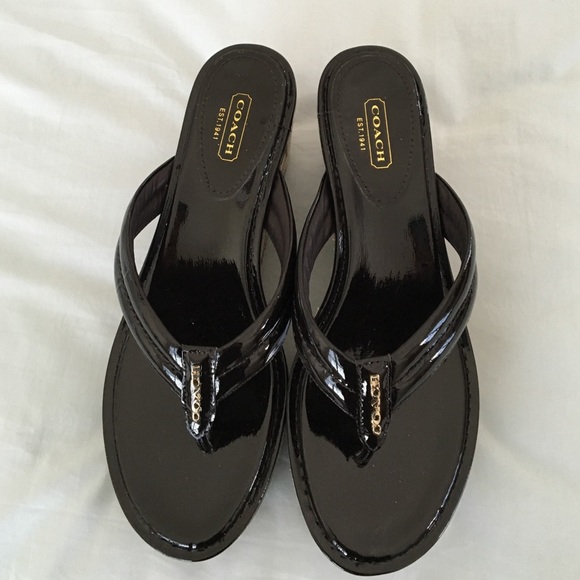 Brand-new brown coach wedge sandals.