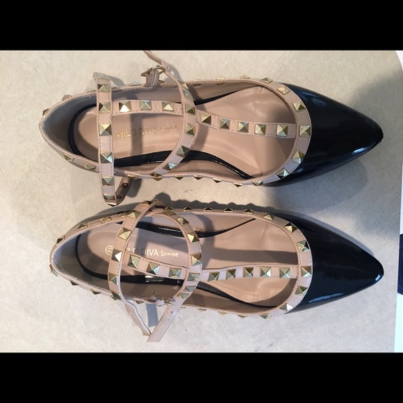 Black and cream studded flats. Not Valentino