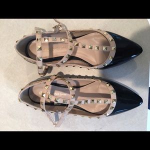 Black and cream studded flats. Not Valentino