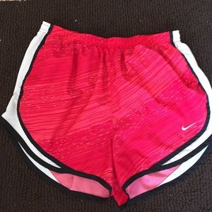 Nike red running shorts