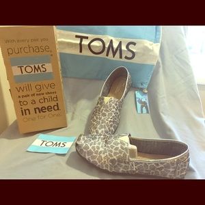 Woman's, size 9.5, Toms, slip-ons.