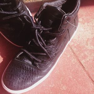 Tom's high top shoes