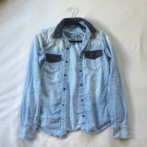 Light blue jean jacket, with leather detailing