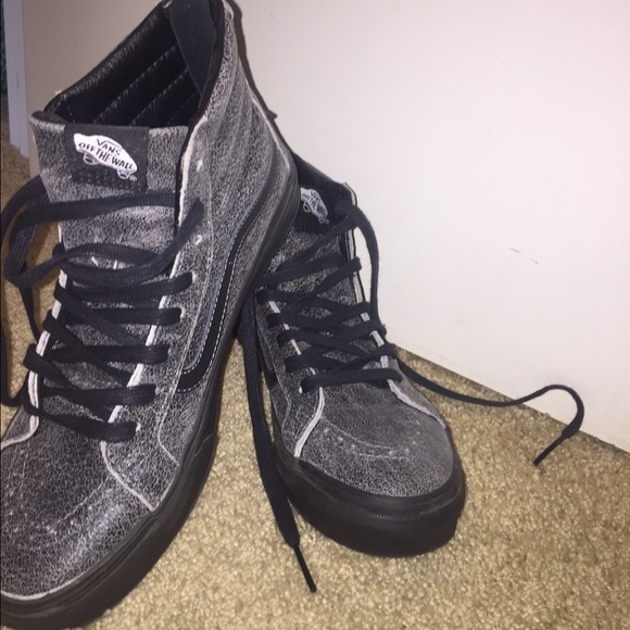 black and gray high top vans