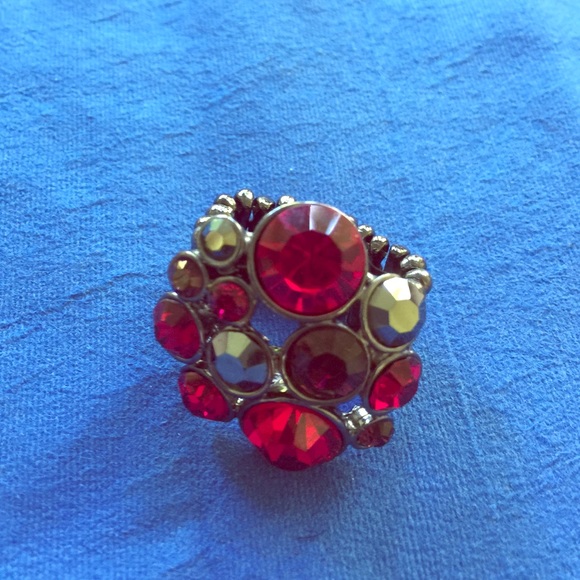 Adjustable shiny red stone ring