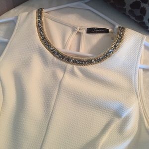 Peplum sleeveless blouse