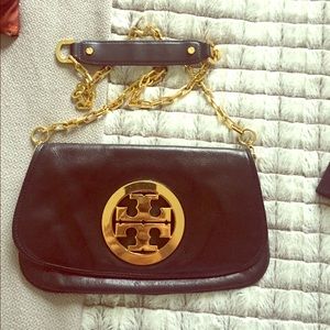Black clutch Tory butch with gold details