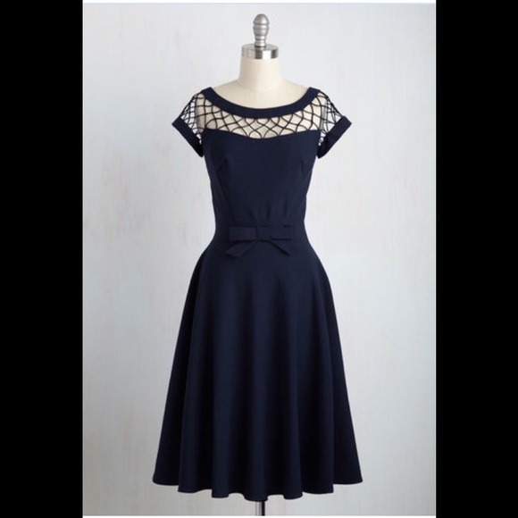 Retro-Inspired Navy Dress with Bateau Neckline