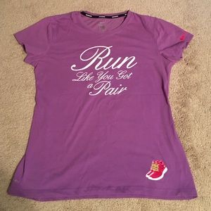 Purple dri fit Nike shirt